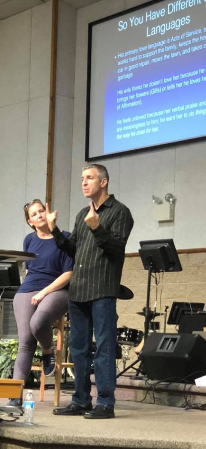 Mike and Christina Feil speaking together at a marriage conference