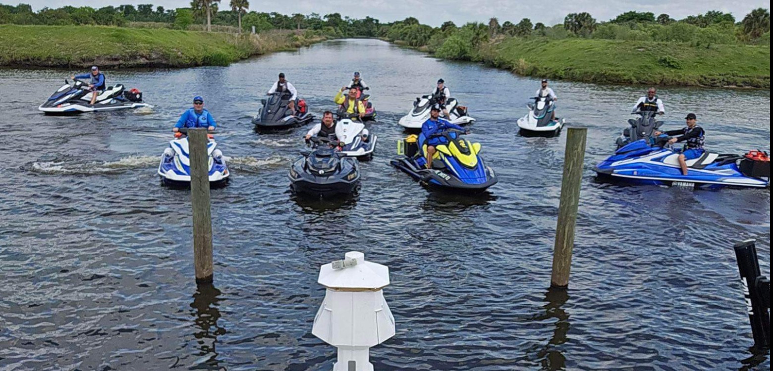 A group of WaveRunner riders gathered on the water